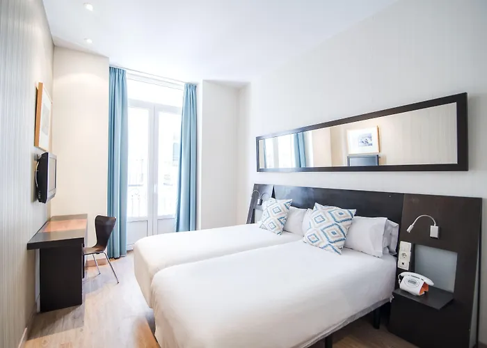 Petit Palace Plaza De La Reina Hotell