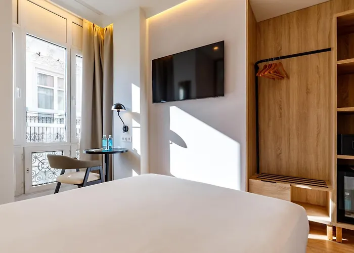 Petit Palace Plaza De La Reina Hotell 3*